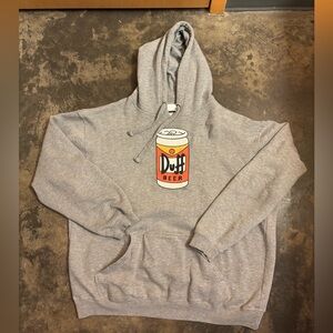 UNIVERSAL STUDIOS SIMPSONS DUFF BEER HOODIE BUILT IN KOOZIE AND BOTTLE OPENER